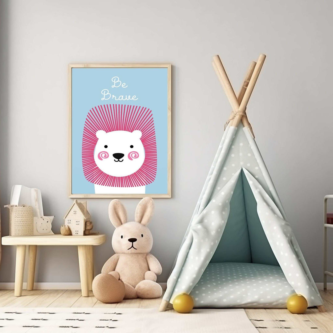 Wadi Home Be Brave Lion Nursery Art with pink mane on blue background, framed wall art for kids room.