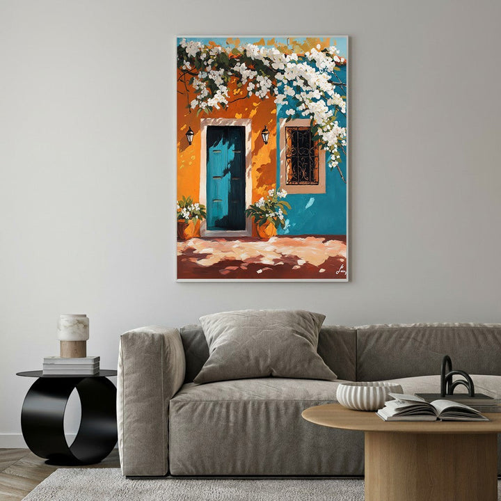 Wadi Home painting of a teal Mediterranean doorway with white blooming flowers, wrought-iron window, and potted plants.