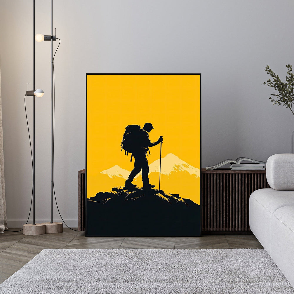 Wadi Home mountain climber silhouette art print, black hiker on yellow sky with snow-capped peaks.