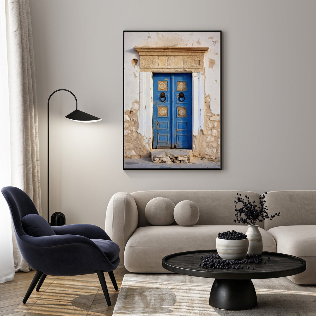 Wadi Home Rustic Blue Doorway Wall Art featuring a weathered blue door with ornate hardware against a textured stone facade.