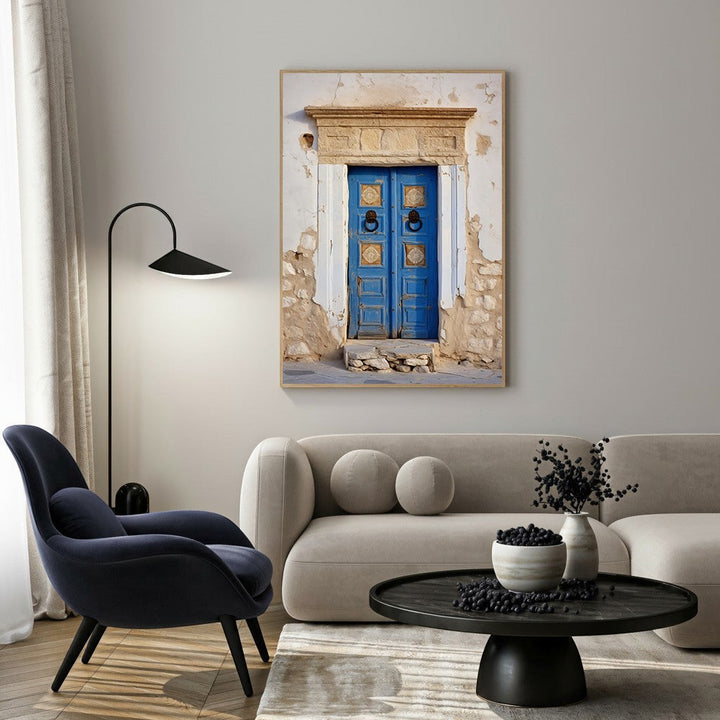 Wadi Home rustic blue doorway wall art with weathered blue door and textured stone facade.