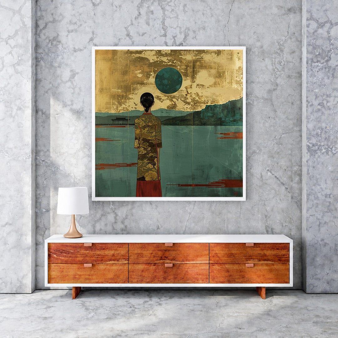 Wadi Home serene landscape wall art with a figure in a gold patterned robe gazing at a teal moon over water.