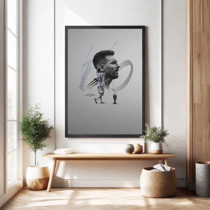 Wadi Home framed wall art featuring a portrait of soccer legend Lionel Messi in his blue and white jersey, with his signature and a trophy graphic.