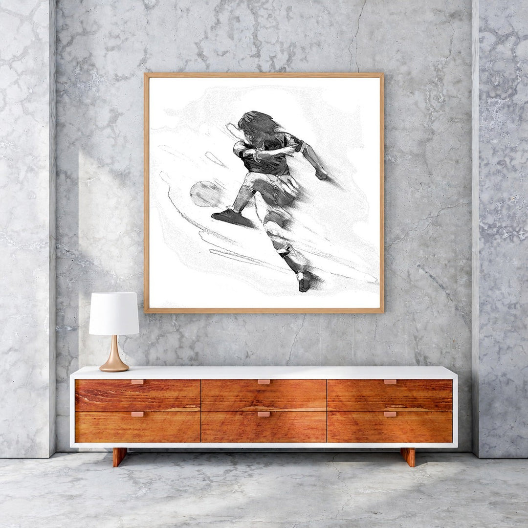 Wadi Home black and white sketch art of a soccer player in mid-kick, conveying energy and speed.