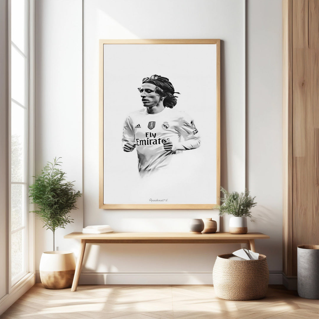 Wadi Home black and white portrait art of a soccer player in a white jersey with 'Fly Emirates' logo, running.