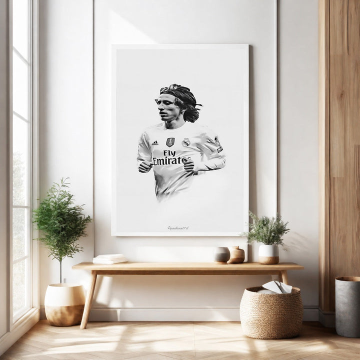 Wadi Home black and white portrait wall art of a soccer player in a white jersey with 'Fly Emirates' logo.