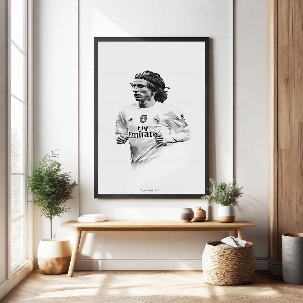 Wadi Home black and white portrait wall art of a soccer player in a white jersey with 'Fly Emirates' logo.