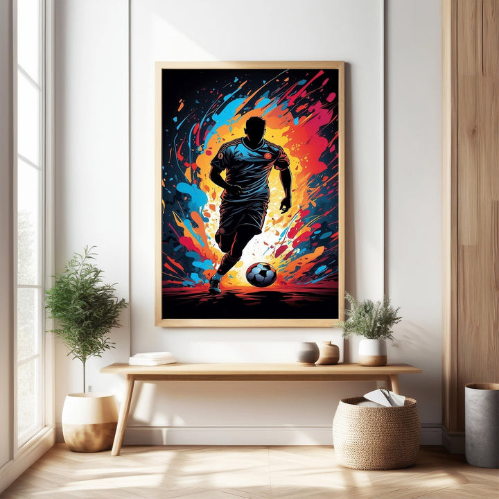 Wadi Home dynamic soccer player wall art, silhouetted player in action with vibrant abstract colors, modern sports decor.