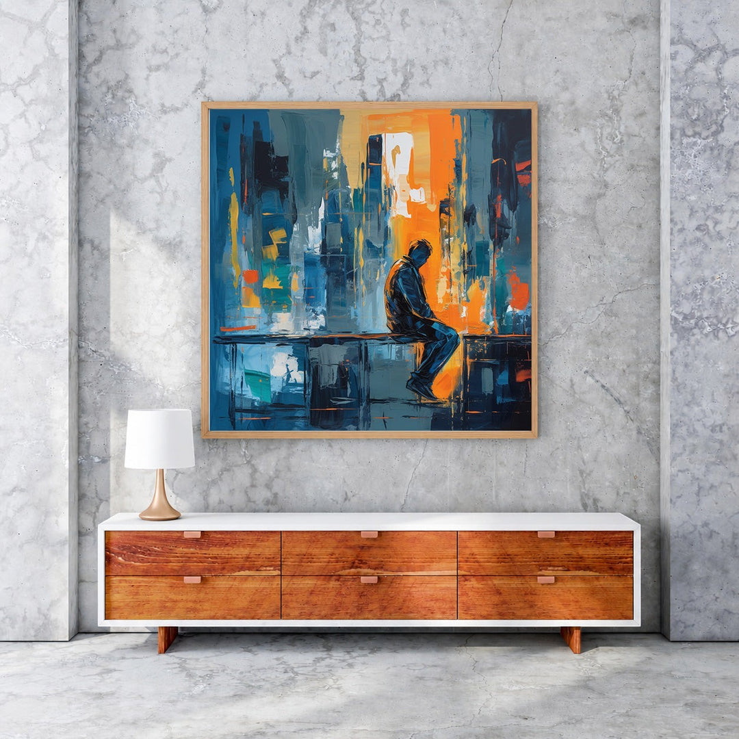 Wadi Home Urban Solitude abstract wall art, featuring a silhouetted figure against a vibrant cityscape in blues, oranges, and grays.
