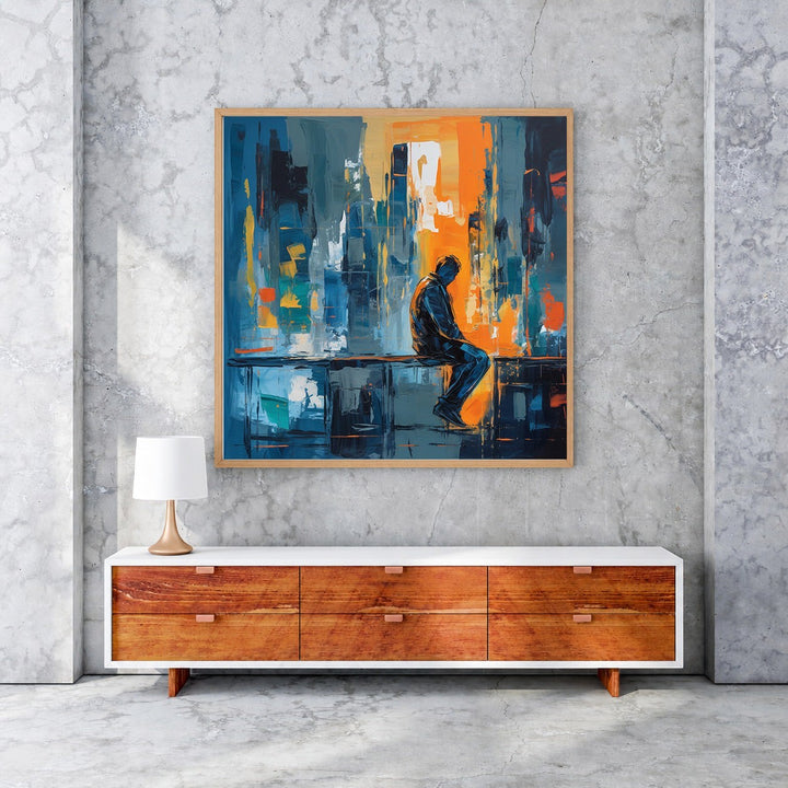 Wadi Home Urban Solitude abstract wall art, featuring a silhouetted figure against a vibrant cityscape in blues, oranges, and grays.