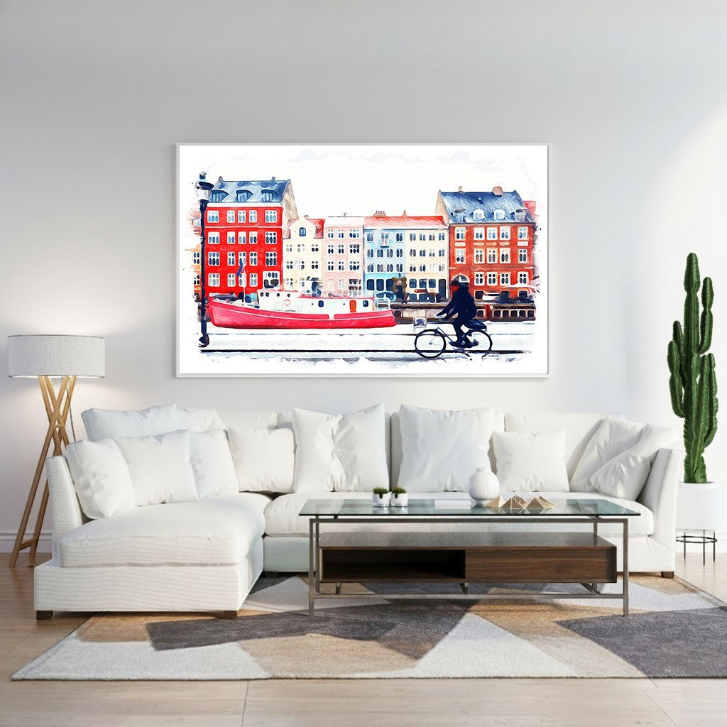 Wadi Home watercolor print of a red boat and cyclist by a canal with colorful buildings. Expressive brushstrokes.