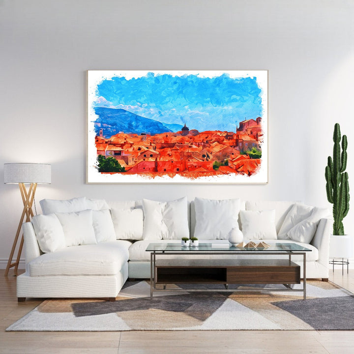 Wadi Home watercolor cityscape wall art featuring terracotta rooftops under a bright blue sky, framed canvas print.