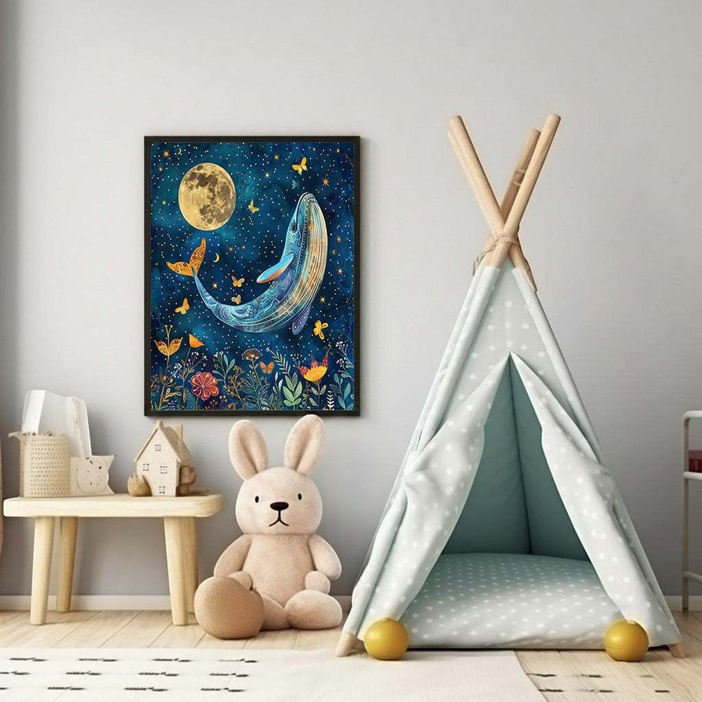 Wadi Home whimsical blue whale art with moon, stars, flowers, and butterflies for nursery decor.