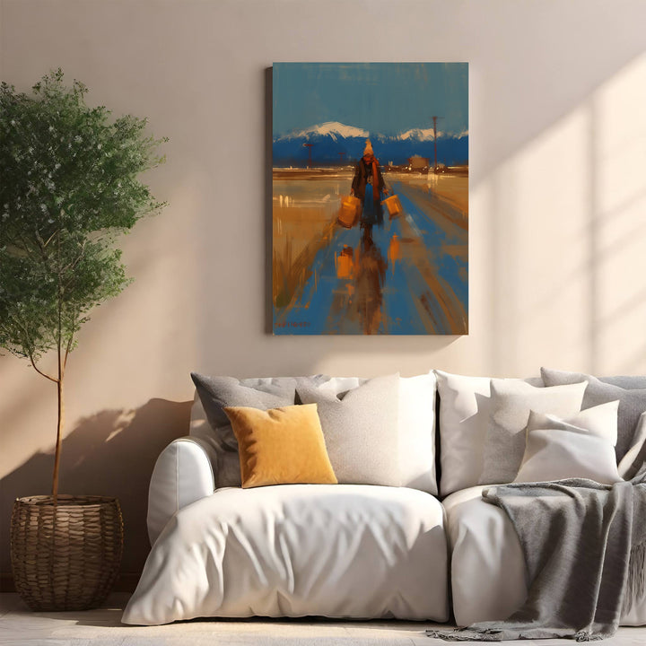 Wadi Home winter landscape painting of a lone figure with luggage walking on a wet path towards snow-capped mountains.
