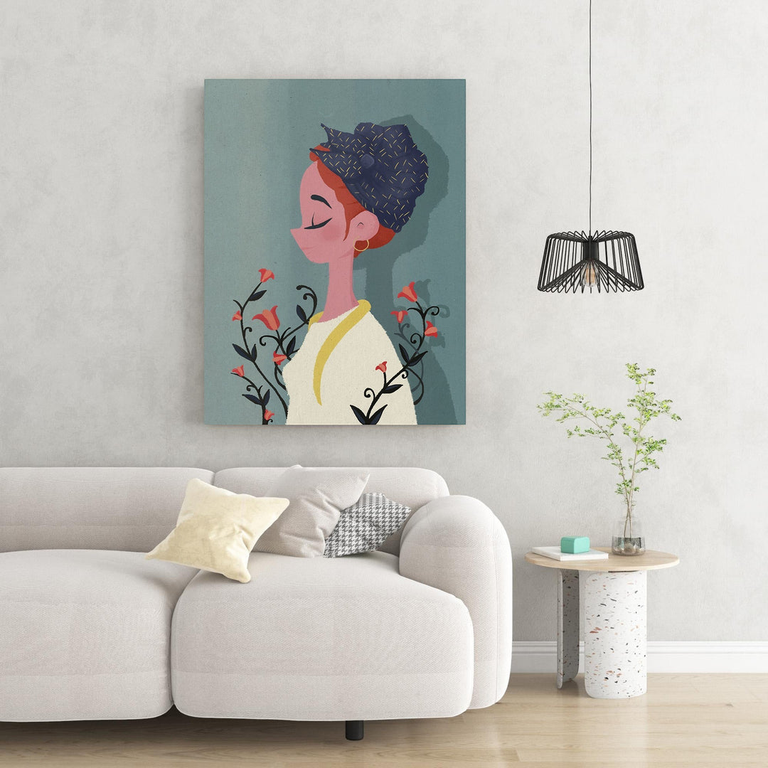 Wadi Home minimalist wall art of a woman with a blue headwrap and red flowers on a teal background.