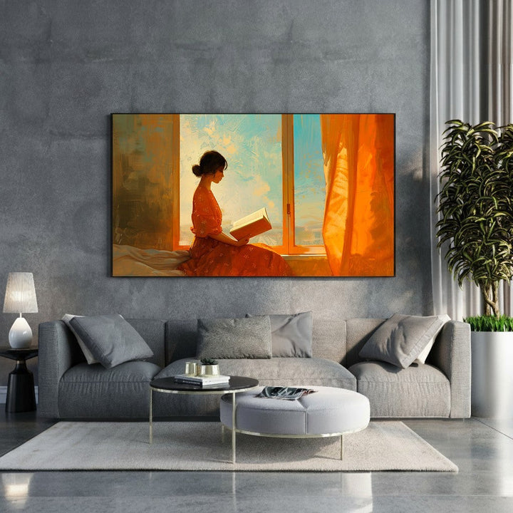 Wadi Home wall art of a woman in an orange dress reading by a window with orange curtains and blue sky.