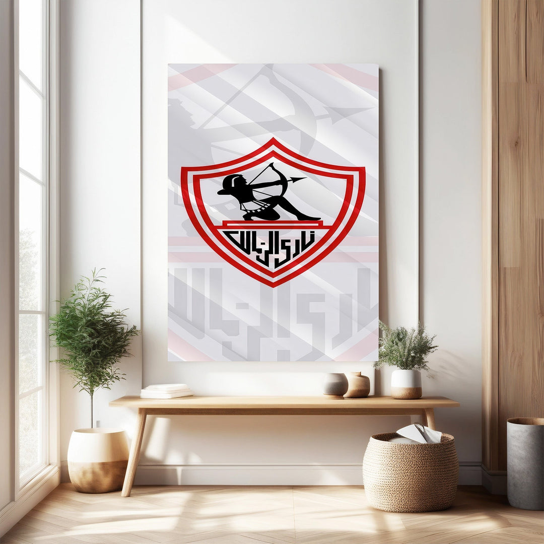 Wadi Home Zamalek Sports Team emblem wall art featuring a red and black shield with an archer graphic. Perfect for fan dens.