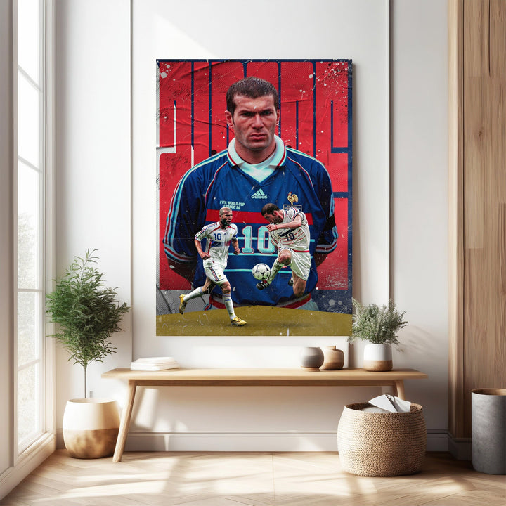 Wadi Home vintage poster of Zinedine Zidane in France's blue football kit, dribbling a ball. Dynamic action artwork.